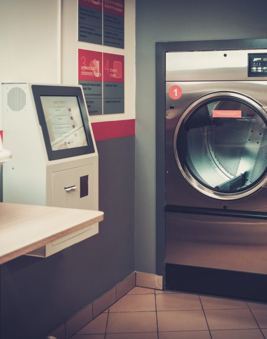 Laundry machines at laundromat shop
